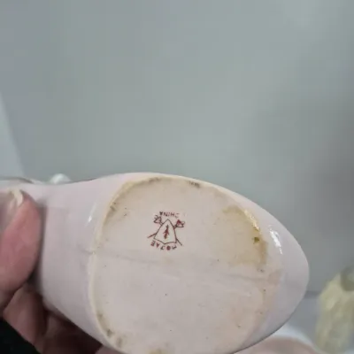 Sale Photo Thumbnail #379: Underside of a vintage MoJae China ceramic piece displaying a red maker's mark.