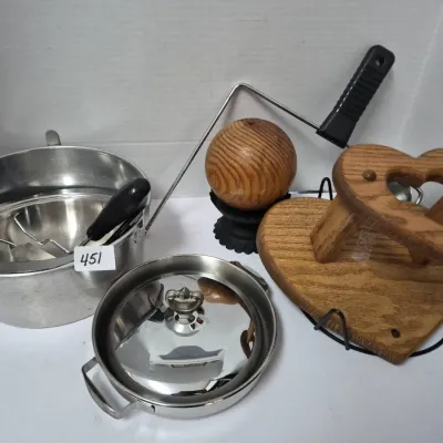 Sale Photo Thumbnail #781: Assorted kitchenware and wooden decor items, including a stainless steel cooking pot, deep fry basket, heart-shaped oak riser, and decorative wooden sphere.