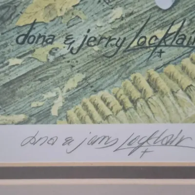 Sale Photo Thumbnail #482: Close-up detail of an art print bearing both a printed and handwritten signature by artists Dona & Jerry Locklair.