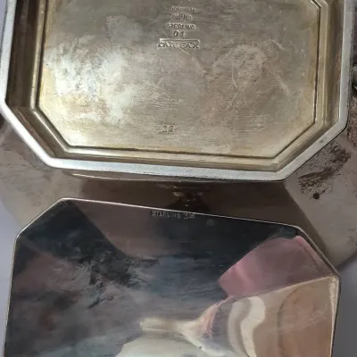 Sale Photo Thumbnail #894: Gorham Sterling 'Fairfax' octagonal silver hollowware piece and lid with clear maker's marks and numbers stamped on the underside.
