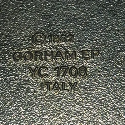 Sale Photo Thumbnail #662: Maker's mark detail reading Gorham EP YC 1708 Italy, dated 1982.