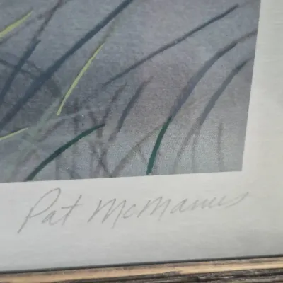 Sale Photo Thumbnail #472: Pencil signature by artist Pat McManus on a matted and framed art print.