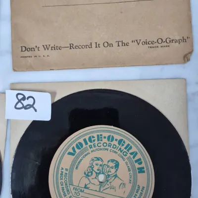 Sale Photo Thumbnail #132: Vintage Voice-O-Graph recording disc by International Mutoscope Corp. with handwritten mailing envelope addressed to Iris Ray Evans.