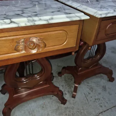 Sale Photo Thumbnail #117: Pair of vintage French Provincial style side tables featuring white marble tops, single drawers with carved flower pulls, and lyre-shaped pedestal bases.
