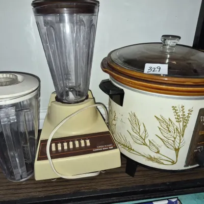 Sale Photo Thumbnail #573: Vintage Hamilton Beach 7-speed blender with an extra plastic pitcher alongside a Hamilton Beach Crock Watcher slow cooker with a herbal motif.