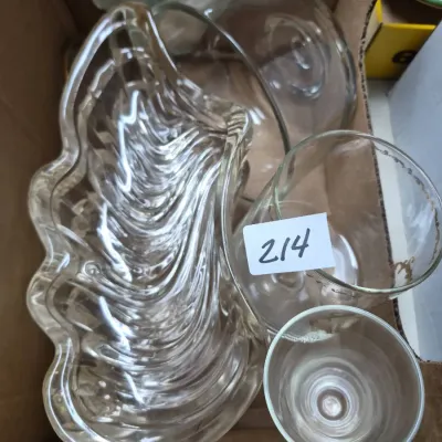 Sale Photo Thumbnail #367: Box lot of assorted clear glassware, including a leaf-shaped or shell-shaped dish, drinking glasses, and a bowl.