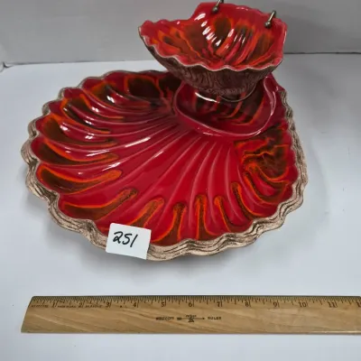 Sale Photo Thumbnail #427: Vintage mid-century shell-shaped ceramic chip and dip set with a vibrant red and orange flame drip glaze.