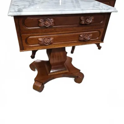 Sale Photo Thumbnail #122: Pair of traditional pedestal end tables featuring white marble tops, wood frames with carved rose drawer pulls, and four-star bases.