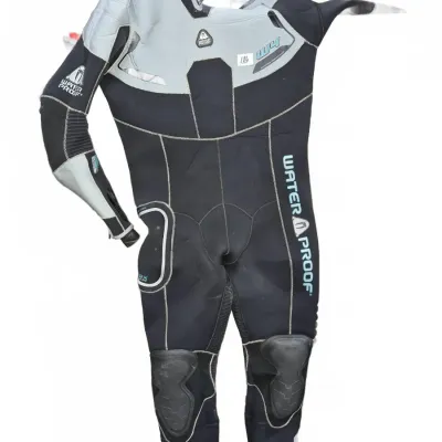 Sale Photo Thumbnail #319: Waterproof brand W4 full-body neoprene wetsuit in black and grey, featuring reinforced knee pads.