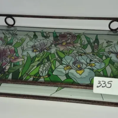 Sale Photo Thumbnail #583: Decorative metal serving tray featuring a stained-glass style panel decorated with irises and dragonflies.