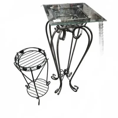 Sale Photo Thumbnail #121: Tall wrought iron plant stand with a square glass top alongside a smaller two-tier metal wire plant stand.