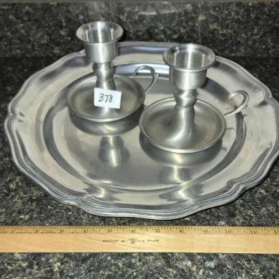 Sale Photo Thumbnail #656: Vintage pewter tray with a scalloped edge paired with two matching pewter chamberstick candle holders.
