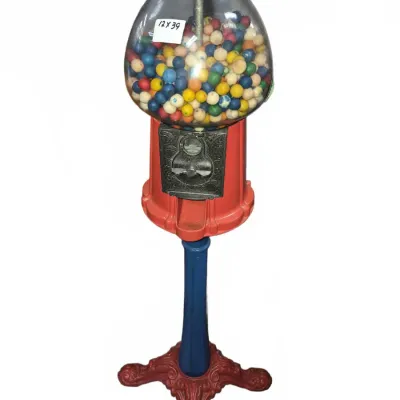 Sale Photo Thumbnail #16: Vintage-style red and blue gumball machine on a cast metal floor stand, filled with colorful gumballs.