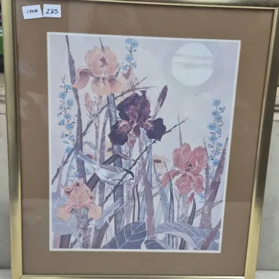 Sale Photo Thumbnail #492: Framed botanical art print by Gloria Eriksen featuring irises, blue forget-me-nots, and a small songbird set in a gold-tone frame with tan matting.