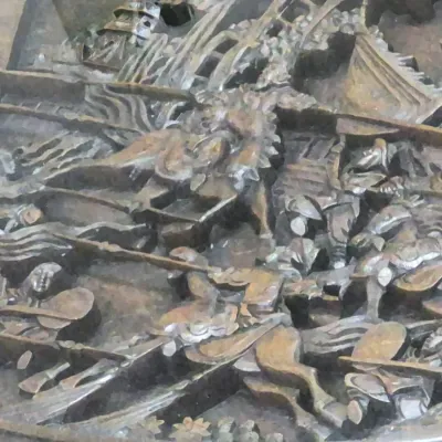 Sale Photo Thumbnail #194: Intricately hand-carved Asian wooden table top depicting a dynamic battle scene with mounted warriors.