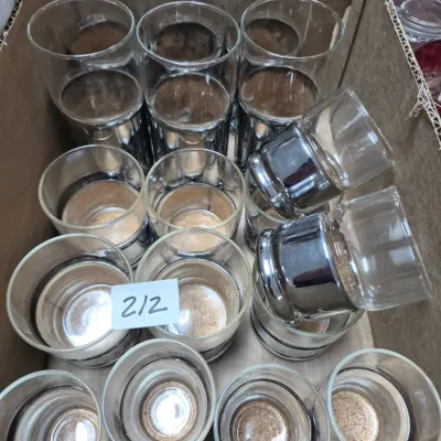 Sale Photo Thumbnail #364: Collection of mid-century silver ombre glassware, including highball and rocks glasses, packed in a cardboard box.