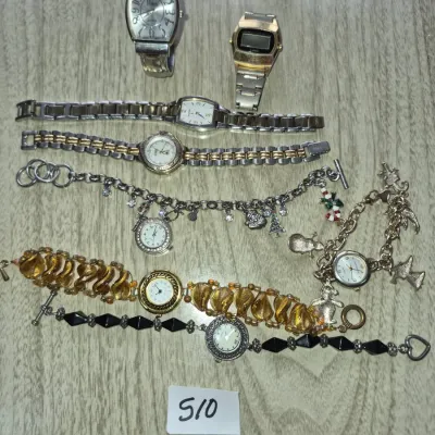 Sale Photo Thumbnail #878: Collection of ladies' vintage and modern wristwatches, including charm bracelet styles, a digital Timex, and link band designs.