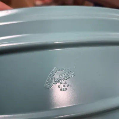 Sale Photo Thumbnail #673: Vintage light blue Boonton Ware Melmac melamine platter, model number 520, featuring an embossed maker's mark on the underside.