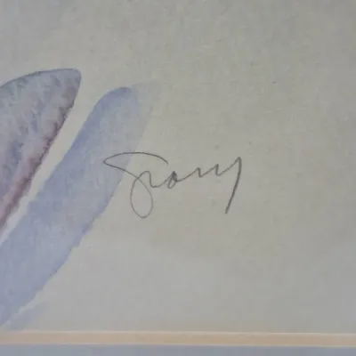 Sale Photo Thumbnail #522: Close-up detail of an artist's signature on a matted watercolor painting featuring soft pastel tones.