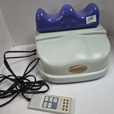 Sale Photo Thumbnail #301: Sunpentown Healthy Swinger chi machine massager with wired remote control and contoured purple footrest.