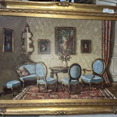 Sale Photo Thumbnail #100: Framed oil painting depicting a classical interior salon scene with light blue upholstered furniture, housed in an ornate giltwood frame.