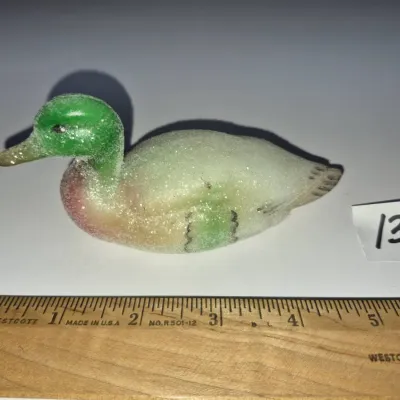 Sale Photo Thumbnail #216: Vintage sugared glass mallard duck figurine, measuring approximately four inches long.