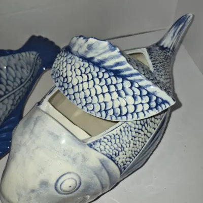 Sale Photo Thumbnail #773: Vintage blue and white glazed ceramic fish-shaped covered tureen or jar with detailed scale textures.