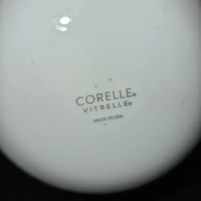 Sale Photo Thumbnail #667: Underside maker's mark on a white Corelle Vitrelle dish, made in the USA.