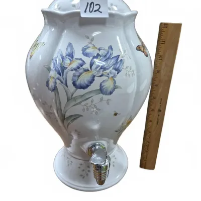 Sale Photo Thumbnail #161: Lenox Butterfly Meadow porcelain beverage dispenser featuring blue iris and butterfly motifs, complete with lid and spigot.