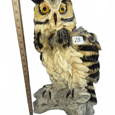 Sale Photo Thumbnail #113: Large vintage ceramic owl statue perched on a branch, measuring approximately 23 inches tall.