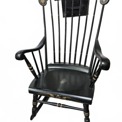 Sale Photo Thumbnail #189: Vintage black-painted Boston rocker with stenciled gold fruit and leaf motifs on the crest rail.