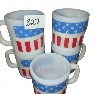 Sale Photo Thumbnail #570: Set of five vintage milk glass coffee mugs with red, white, and blue American flag patriotic motifs.