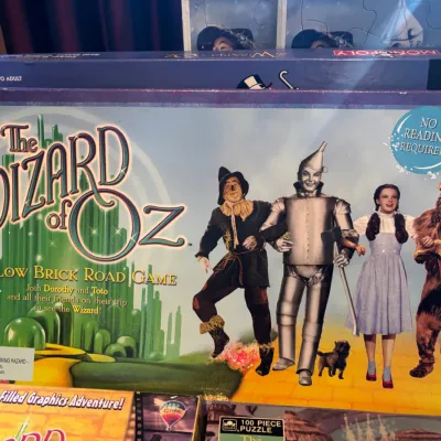 Vintage Pressman 'The Wizard of Oz Yellow Brick Road Game' in its original box, featuring iconic imagery of Dorothy and her...