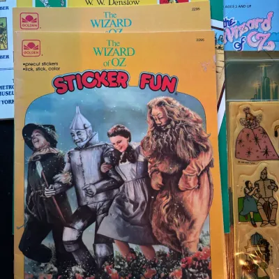 Sale Photo Thumbnail #120: Collection of vintage Wizard of Oz storybooks, activity books, and sticker sheets, including a Golden Sticker Fun book.
