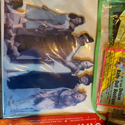Sale Photo Thumbnail #144: Vintage 1990 Wizard of Oz Stand-Me-Up cardboard easel cutout featuring main characters, sealed in original packaging.