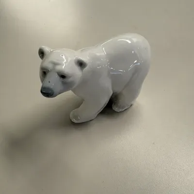 LLadro Glazed porcelain polar bear figurine with subtle painted details on the snout and ears.