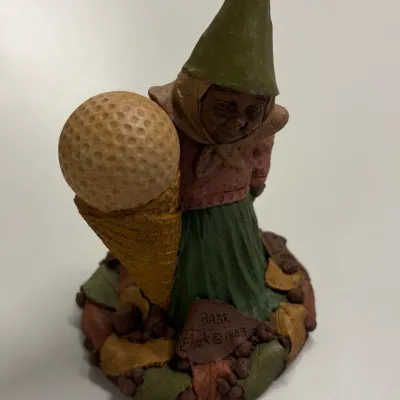 Tom Clark gnome figurine titled "Babe," depicting a gnome holding a golf ball ice cream cone, dated 1988.