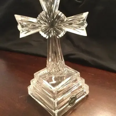 Lenox crystal cross sculpture featuring a starburst motif and tiered square pedestal base, made in Germany.