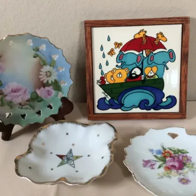 Collection of decorative porcelain and ceramic items including a framed Noah's Ark tile, an Order of the Eastern Star trinket dish,...