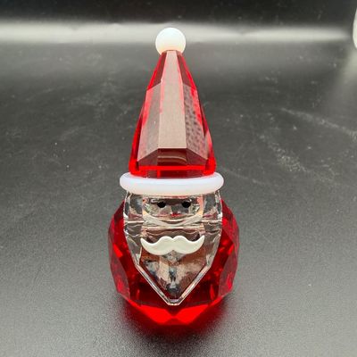 Sale Photo Thumbnail #6: Swarovski crystal Santa Claus figurine featuring faceted red crystal and frosted white detailing, in excellent condition.