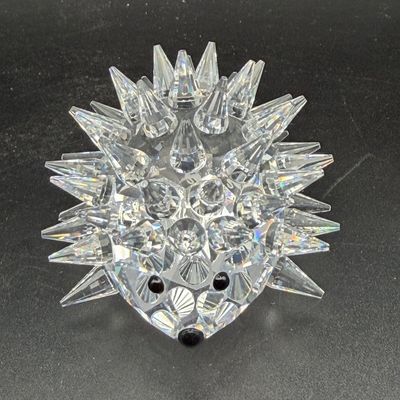 Sale Photo Thumbnail #48: Swarovski crystal hedgehog figurine featuring pointed spikes and black crystal eyes and nose, in excellent condition.