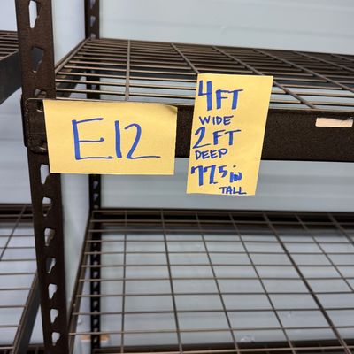 Sale Photo Thumbnail #35: E12-Metal Shelving Unit

See photos for dimensions