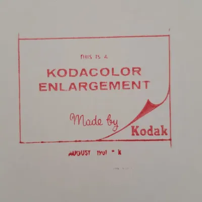 Vintage Kodacolor Enlargement stamp on the back of a photograph, dated August 1961.