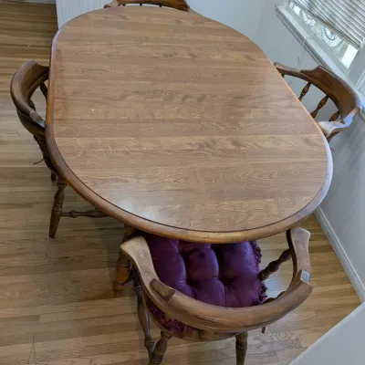 Spacious Colonial Oval Extension Dining Table with 4 Captain's Chairs