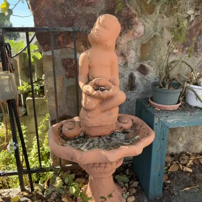 Charming Terracotta-Tone Cherub Boy Garden Fountain Statue with Shell Basin