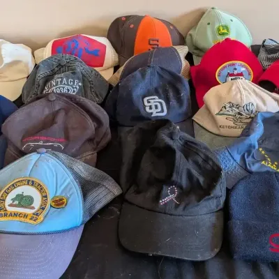 Assortment of Baseball Caps & Beanie: San Diego, John Deere, Alaska, Racing