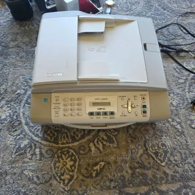 Sale Photo Thumbnail #116: Brother MFC-290C all-in-one color inkjet printer, fax, scanner, and copier, showing slight yellowing on the control panel plastic.
