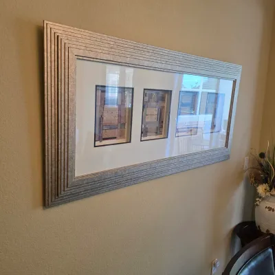 Sale Photo Thumbnail #74: Large contemporary framed triptych wall art featuring abstract mixed-media panels in a layered silver-toned stepped frame.