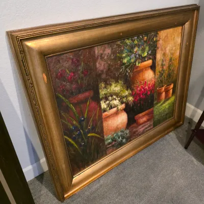 Sale Photo Thumbnail #18: Large oil painting on canvas depicting terracotta pots and vibrant flowers, set in a substantial gold-finished wood frame with slight edge wear.