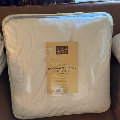 Sale Photo Thumbnail #48: Woolrich Home white down-alternative comforter, full/queen size, packaged in its original zippered plastic case.